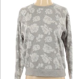 Bethany Mota white floral print sweater.